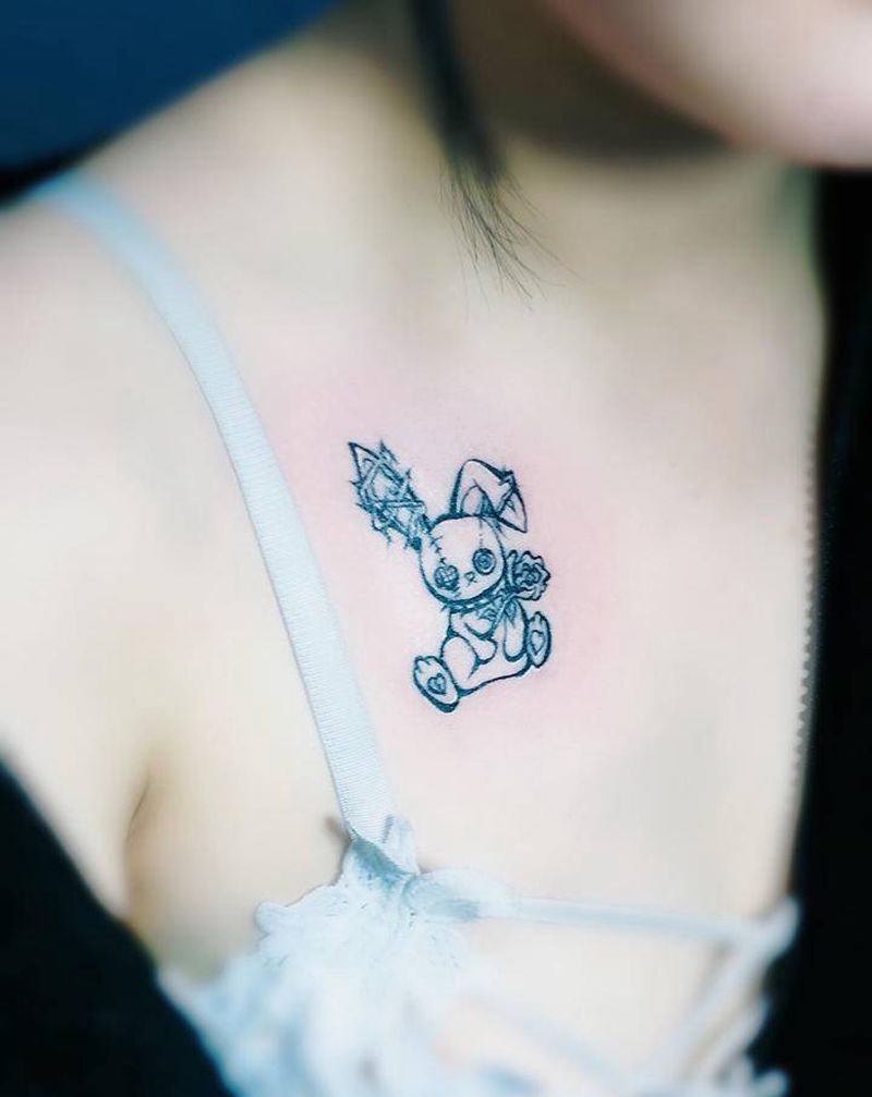 荆棘兔纹身图片_胸部图腾纹身图案