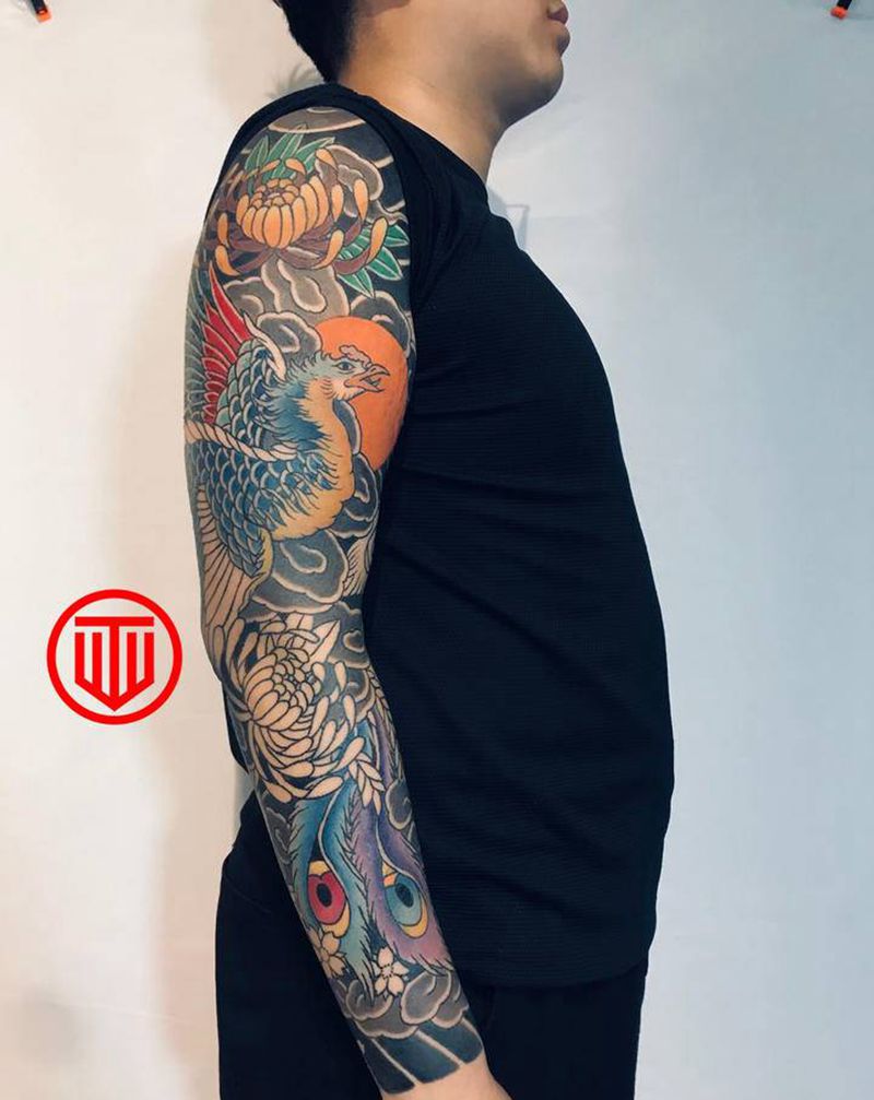 凤凰 进度纹身图片_手臂老传统纹身图案