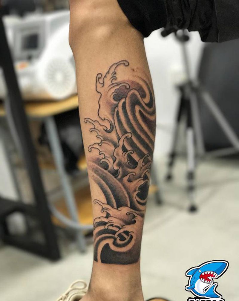 浪腿纹身图片_腿部纹身图案