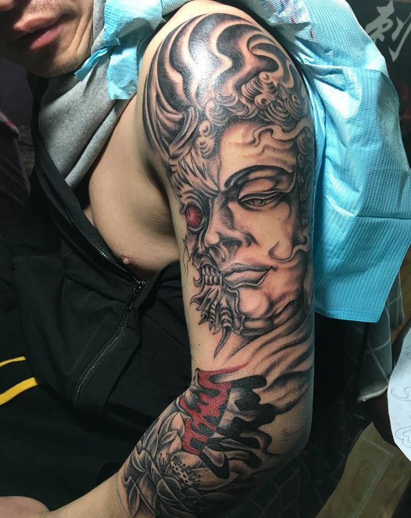 善恶一念之间纹身图片_手臂纹身图案