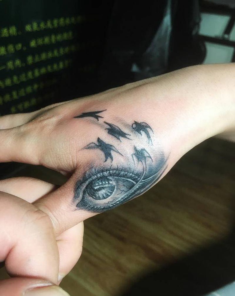 疤痕遮盖纹身图片_手部纹身图案