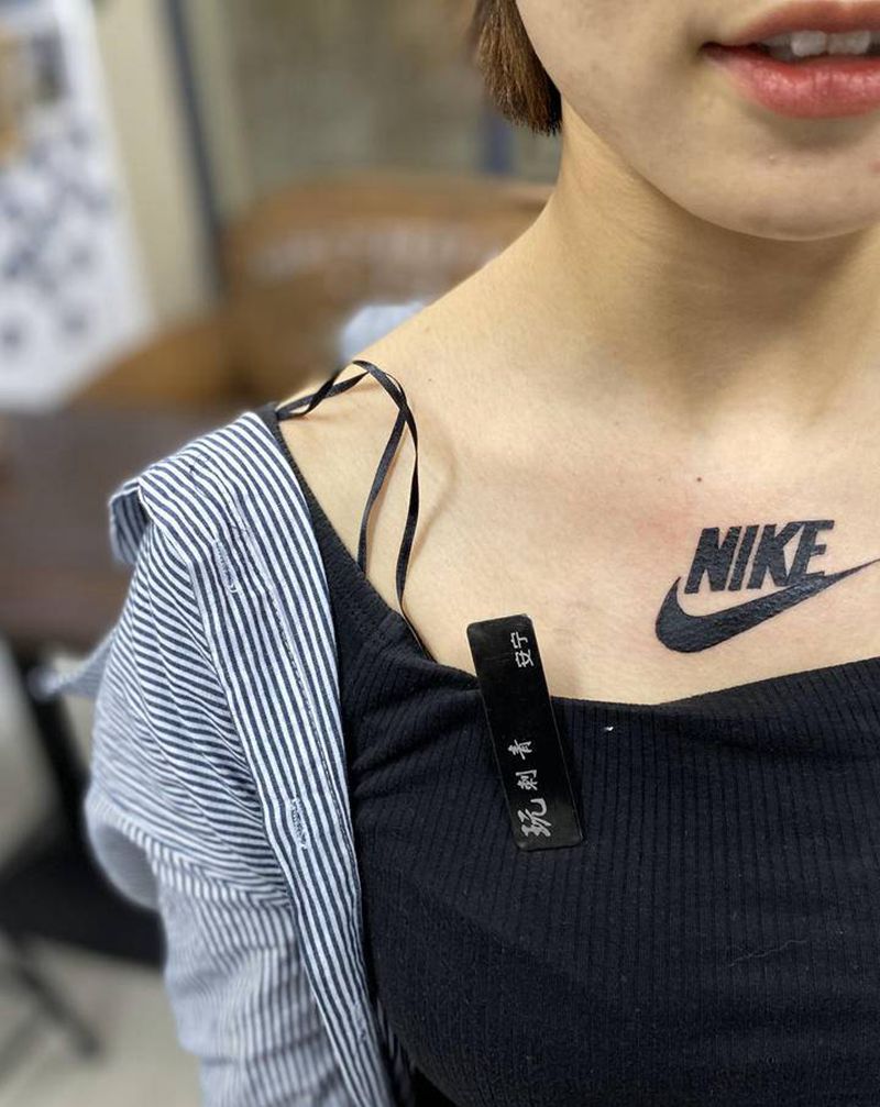 耐克纹身图片_胸部图腾纹身图案