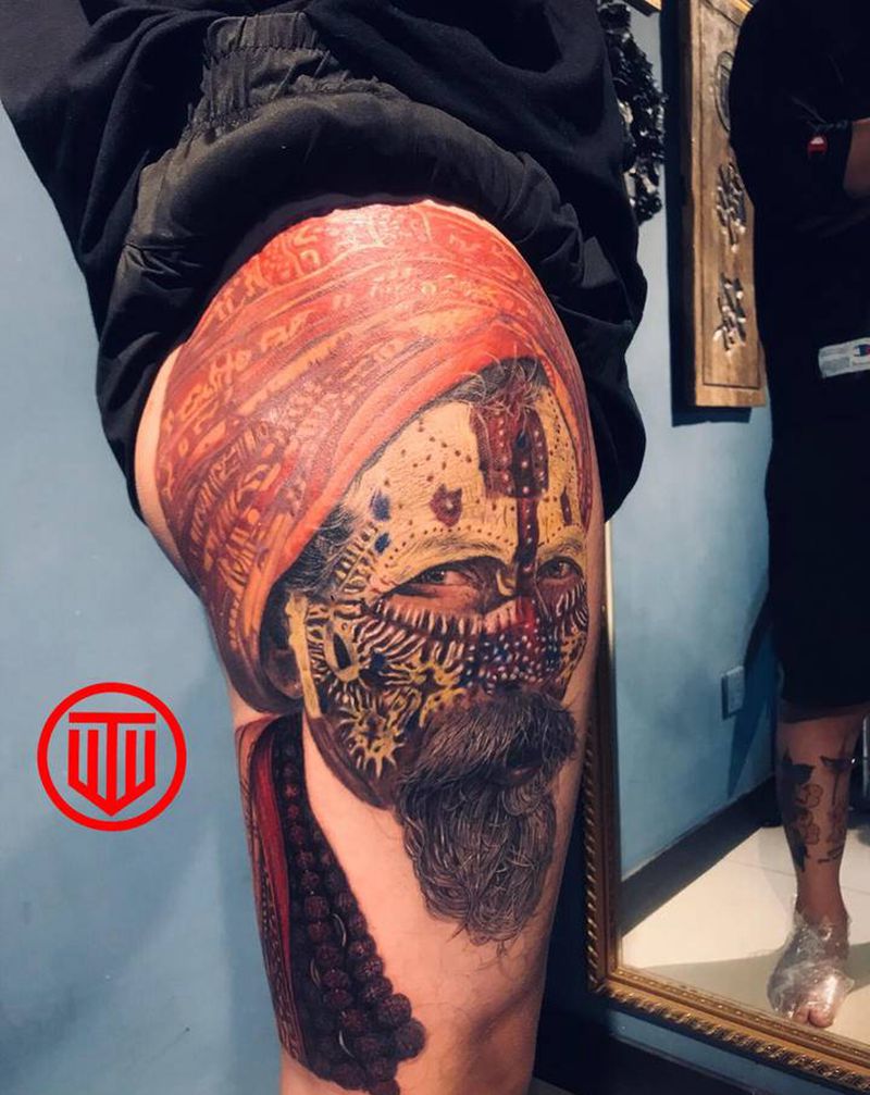 挂的是几瓣金刚纹身图片_腿部欧美写实纹身图案