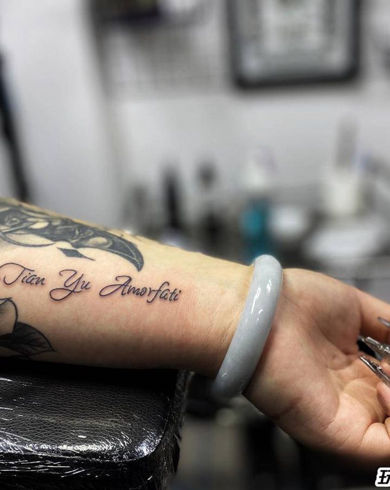 英文字纹身图片_手臂花体字纹身图案