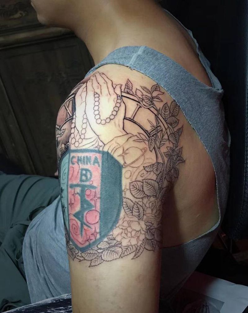 拯救不开心纹身图片_肩部手臂纹身图案