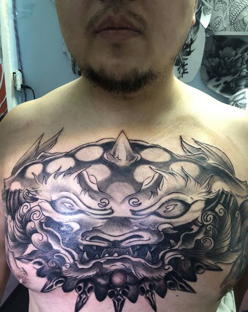 唐狮纹身图片_胸部纹身图案
