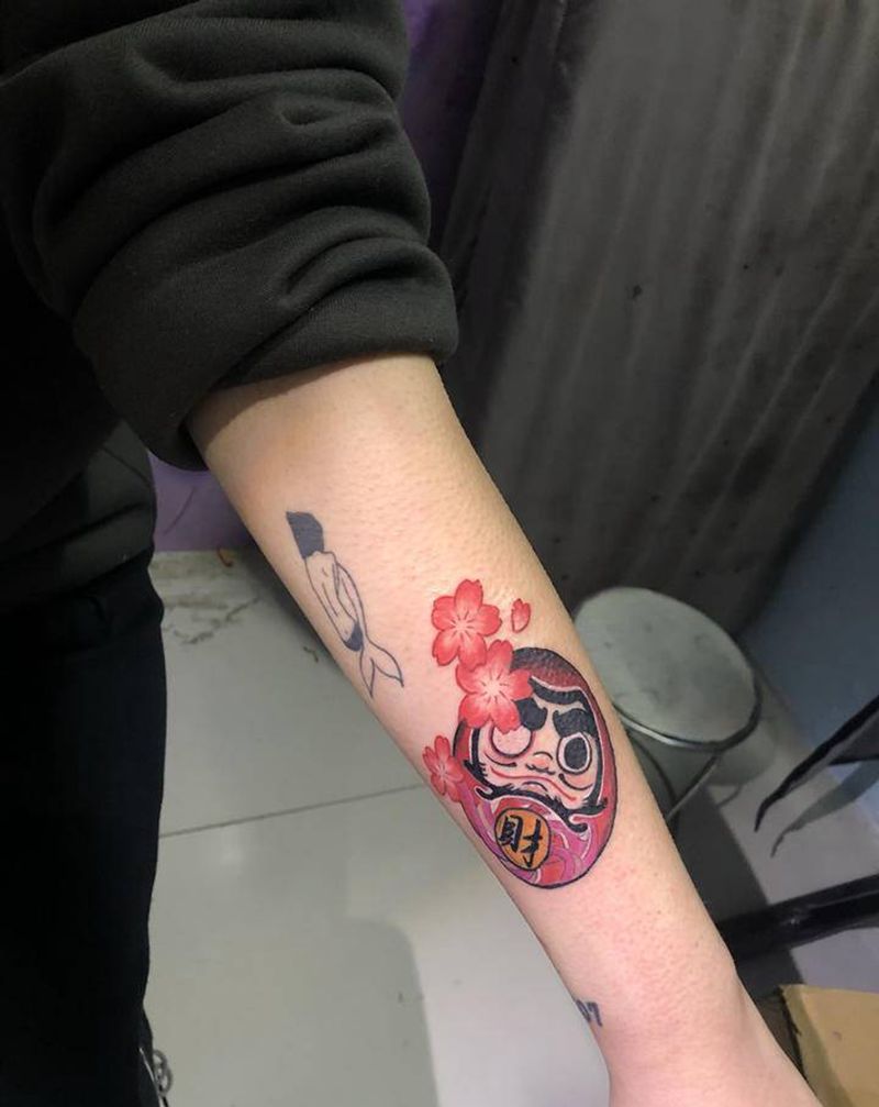 达摩蛋纹身图片_手臂纹身图案