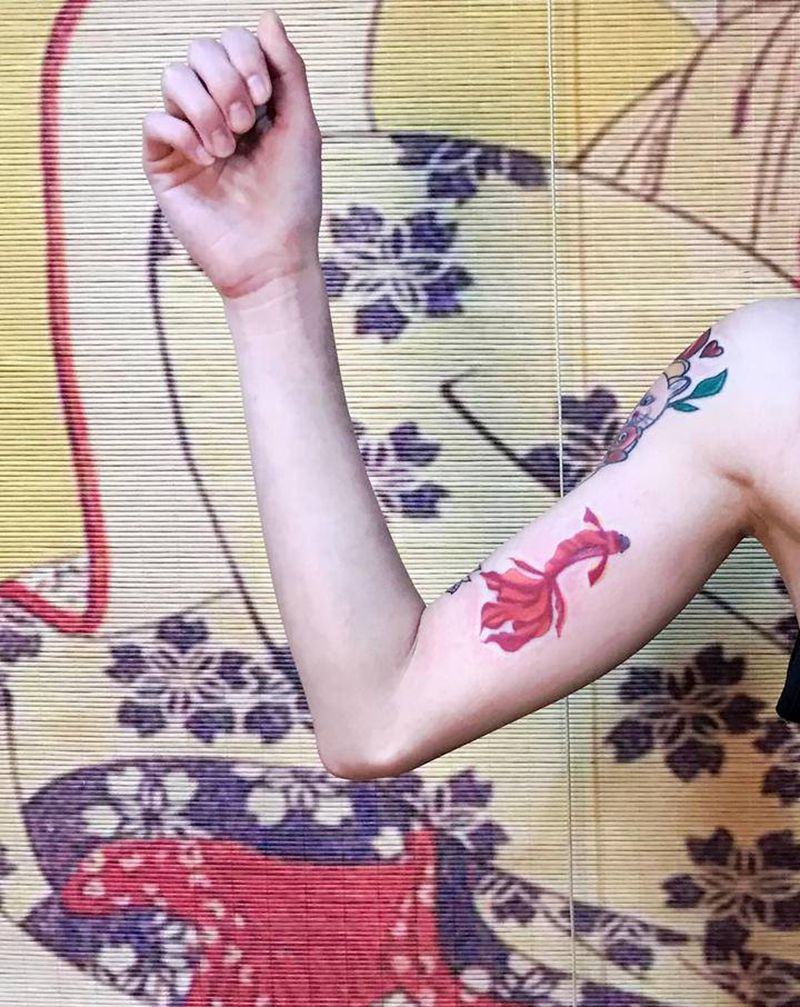 慢慢拼纹身图片_手臂鱼猫纹身图案