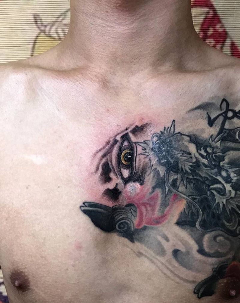 原订制的麒麟恢复后加订一只眼睛纹身图片_胸部新传统眼睛纹身图案