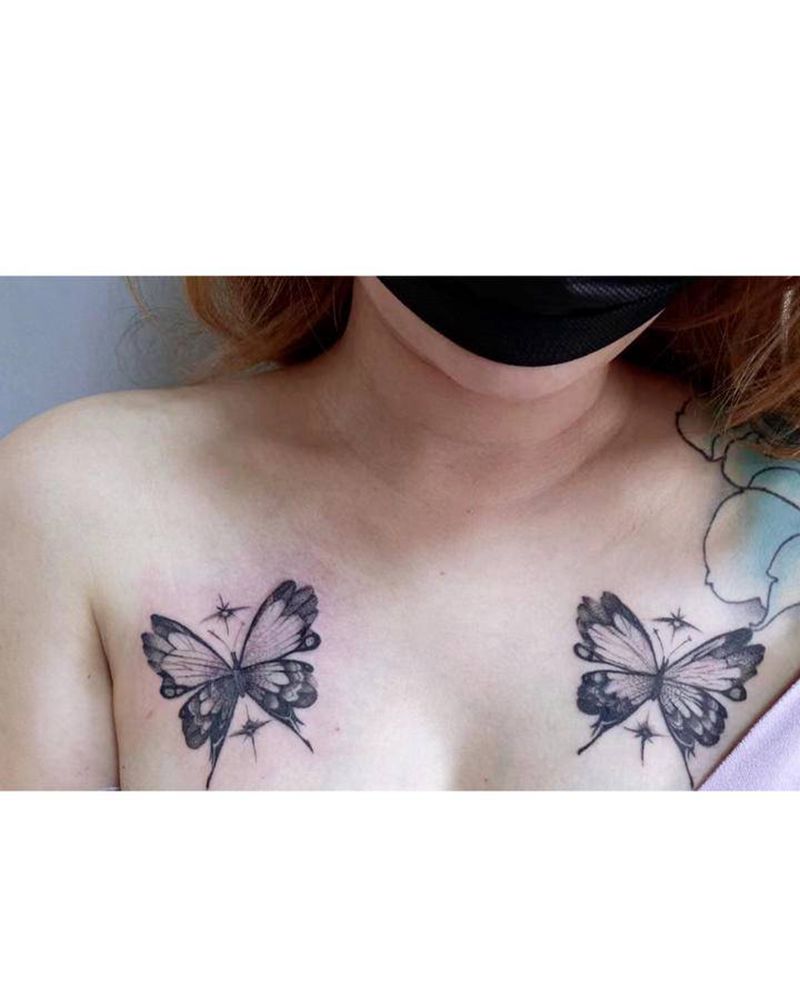 蝴蝶纹身图片_肩部胸部点刺蝴蝶纹身图案