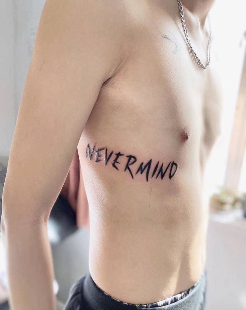 nevermind纹身图片_胸部腰部图腾花体字花体字纹身图案