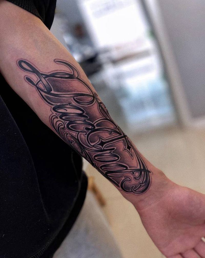 原创奇卡诺花体纹身图片_手臂手部花体字花体字纹身图案