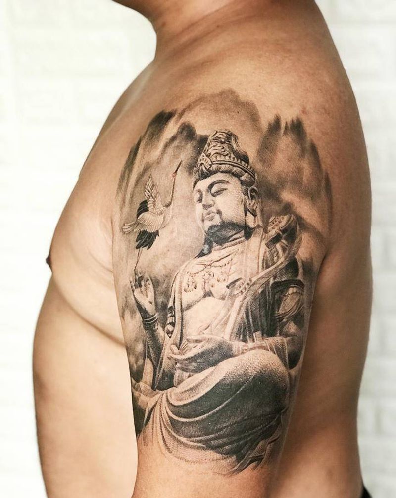 大臂佛像纹身图片_手臂纹身图案
