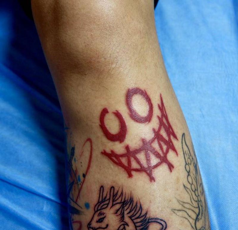 标志纹身图片_腿部图腾纹身图案