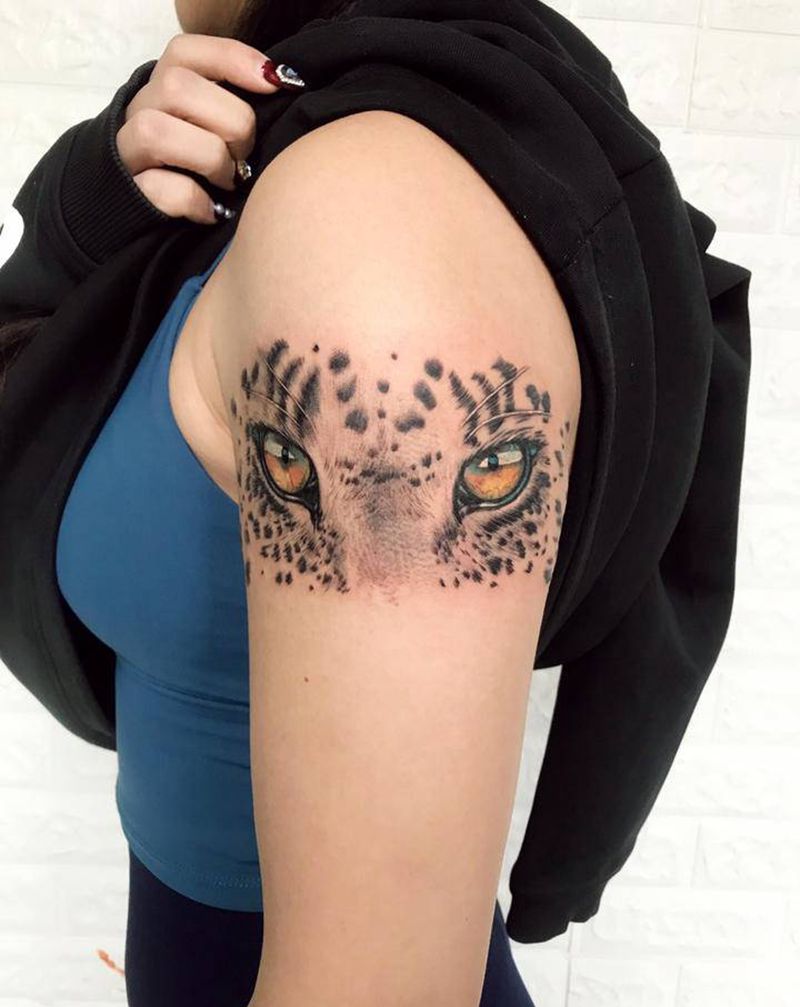 豹子眼睛纹身图片_手臂欧美写实纹身图案