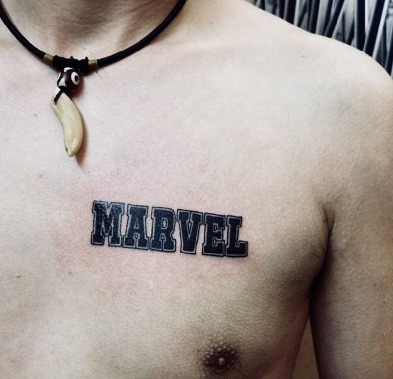 店内吉吉作品纹身图片_胸部手臂图腾花体字纹身图案