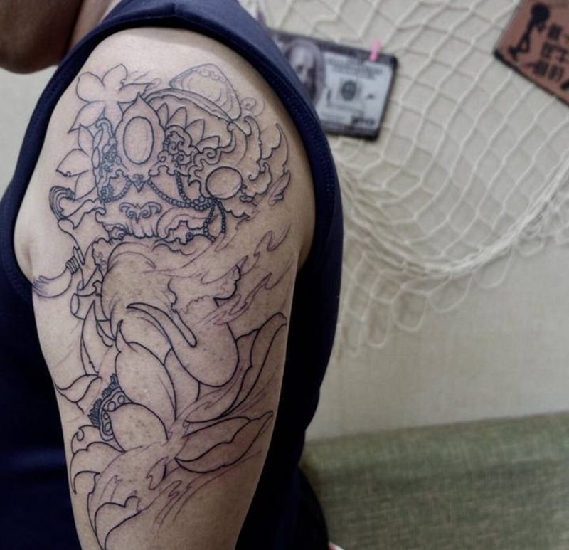 学员作品纹身图片_手臂新传统象神纹身图案