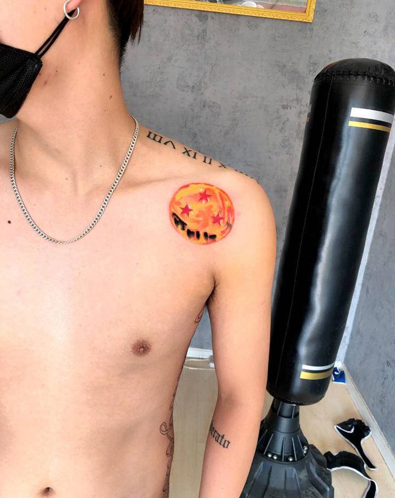 龙珠一枚纹身图片_肩部水彩纹身图案