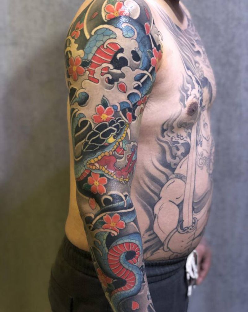 日式花臂纹身图片_手臂手部老传统纹身图案