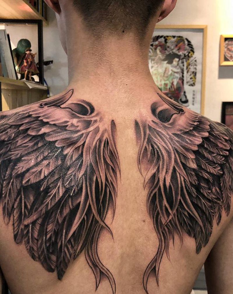 涅槃纹身图片_背部欧美写实纹身图案