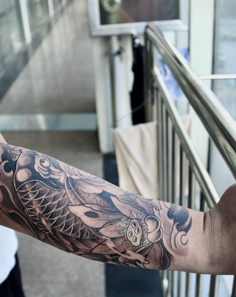 鲤鱼纹身图片_手臂新传统鲤鱼纹身图案