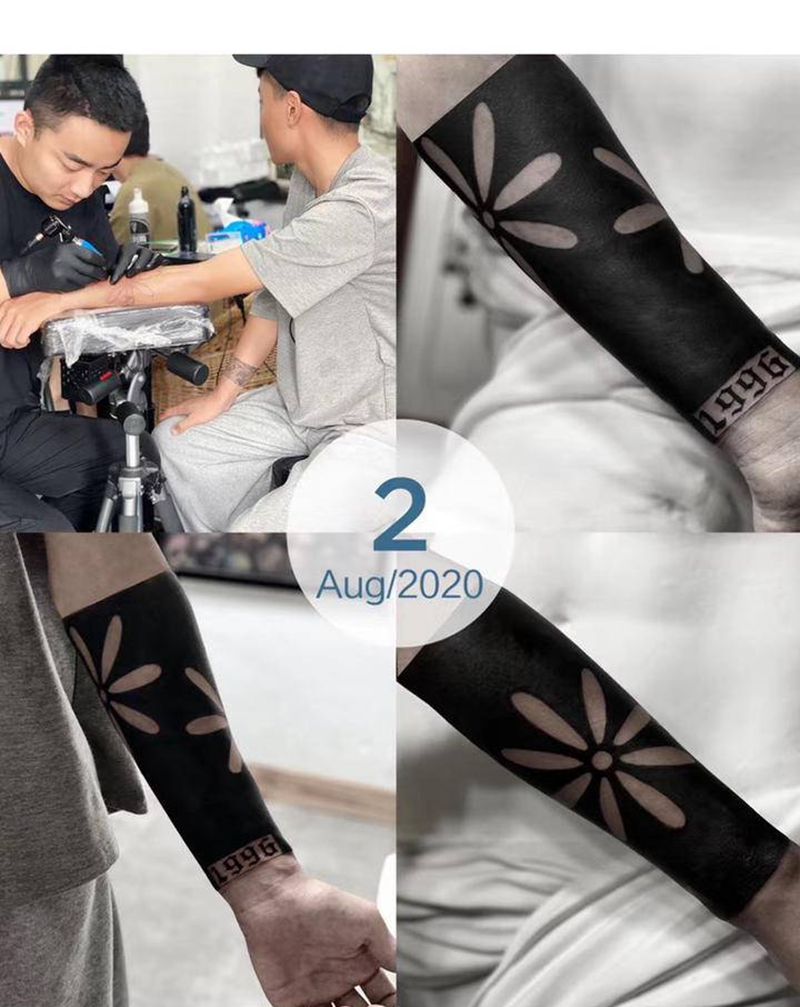 黑臂镂空纹身图片_手臂纹身图案