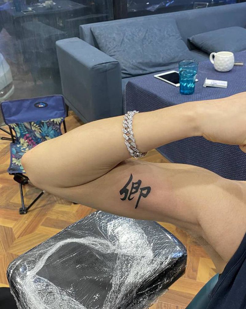 卿纹身图片_手臂纹身图案