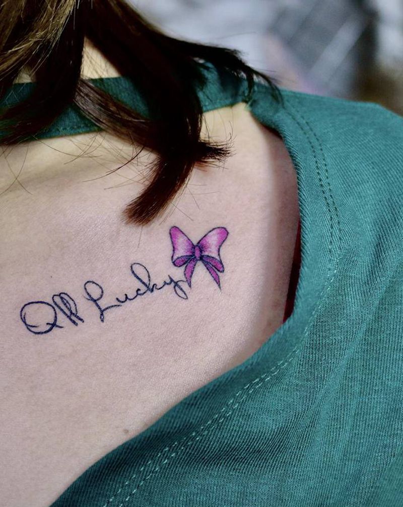 店内小图纹身图片_胸部背部花体字纹身图案