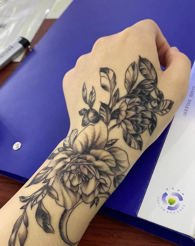 素花遮盖纹身图片_手臂点刺纹身图案