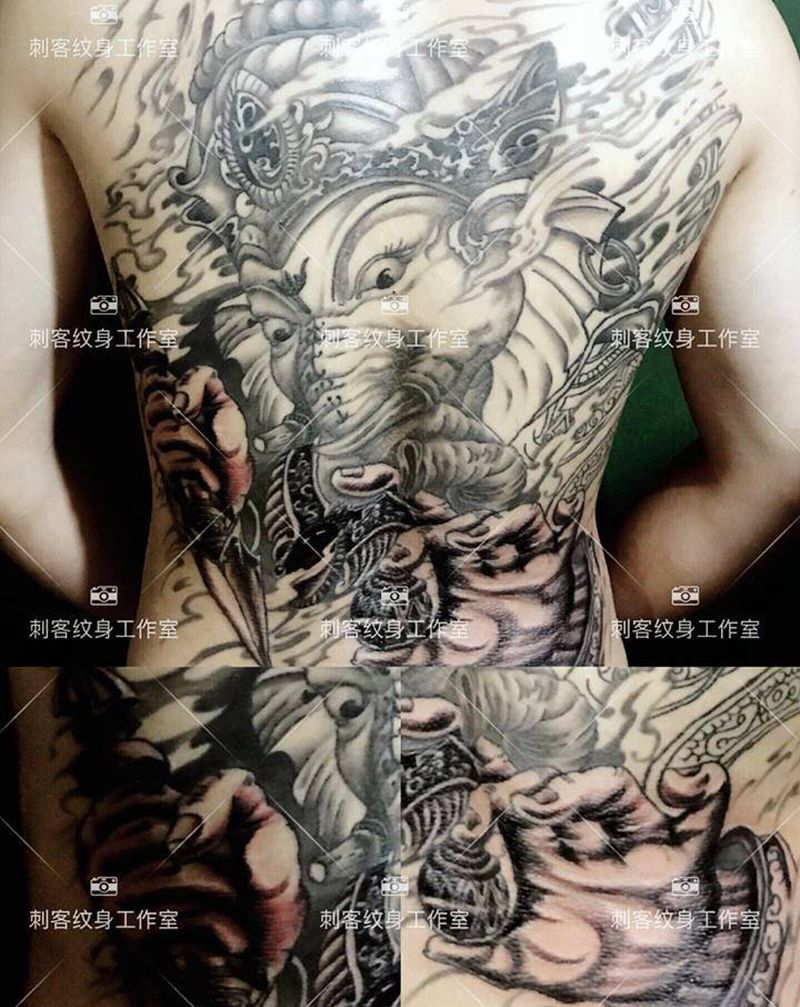 未完成纹身图片_背部纹身图案