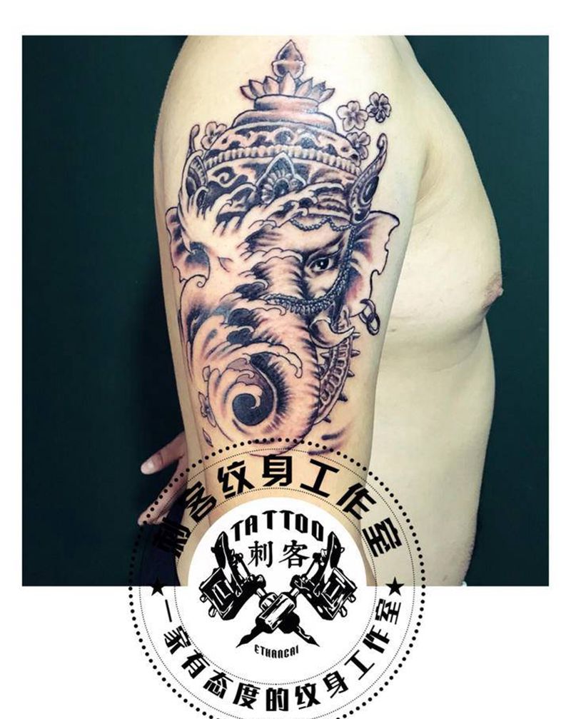 浪花象神纹身图片_手臂纹身图案