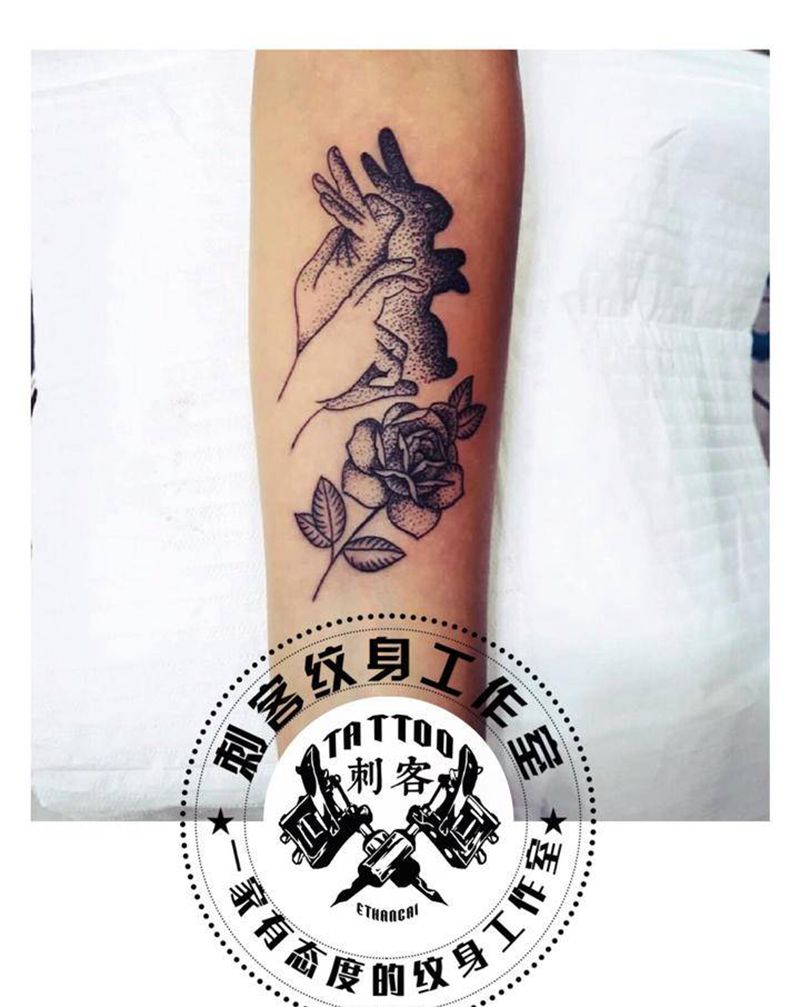 手影纹身图片_腿部纹身图案