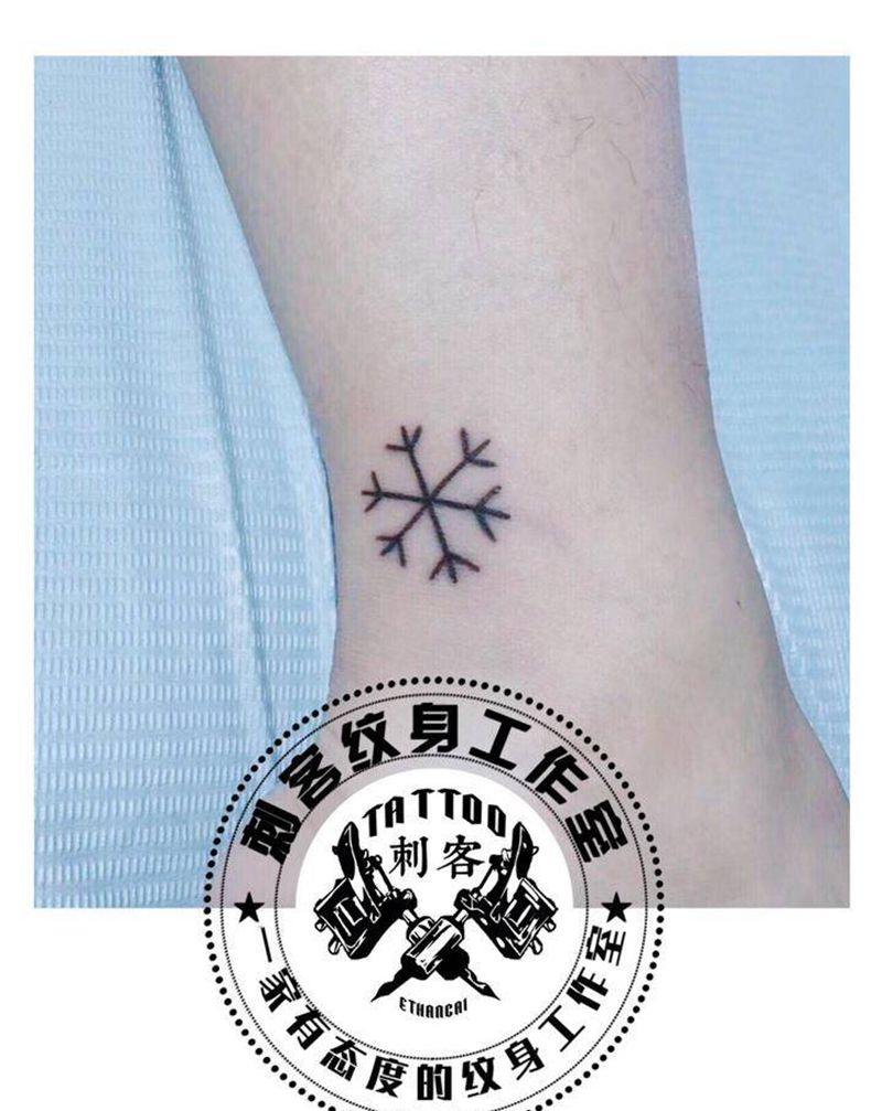 雪花勇闯天涯纹身图片_腿部纹身图案
