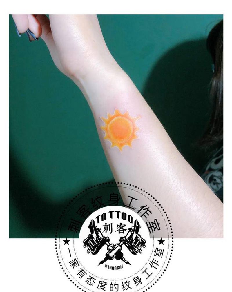 小太阳纹身图片_手臂纹身图案