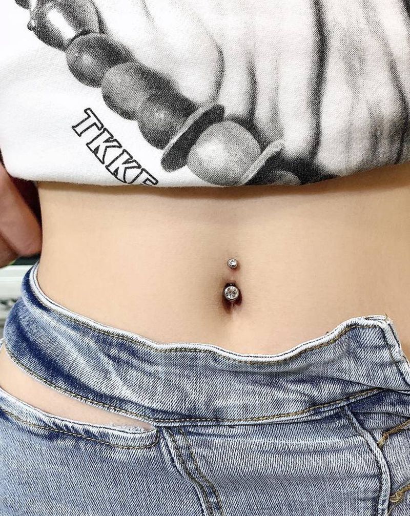 钉纹身图片_穿孔纹身图案