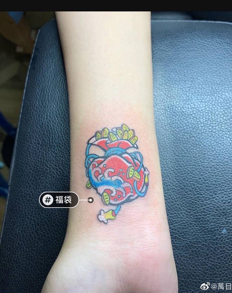 福袋纹身图片_手臂日式纹身图案