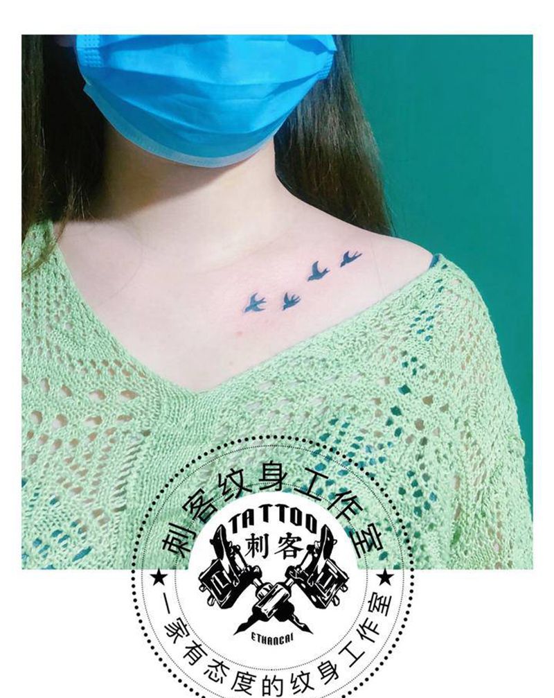 小燕子纹身图片_颈部纹身图案