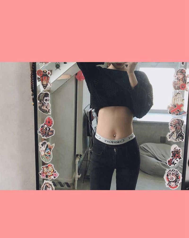 脐钉纹身图片_腰部纹身图案