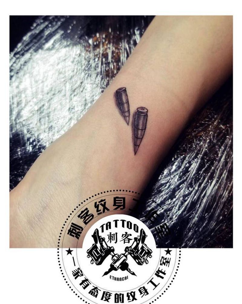 子弹纹身图片_手臂纹身图案