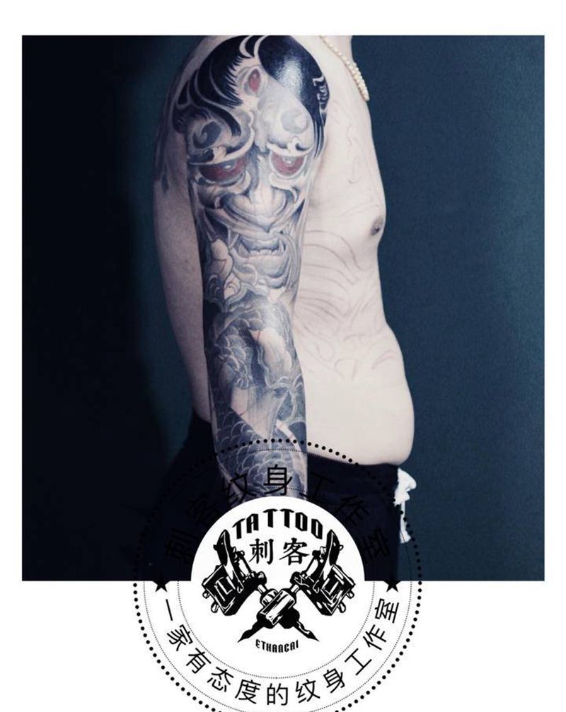 毁皮遮盖纹身图片_手臂纹身图案