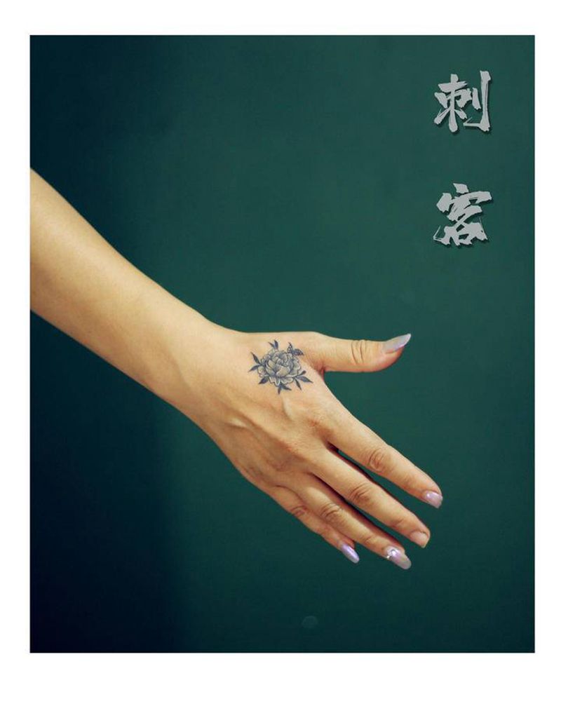 遮盖纹身图片_手部纹身图案