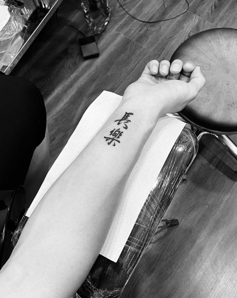 貌似情侣纹身图片_手臂纹身图案