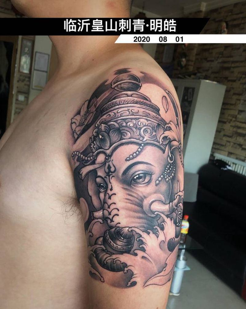 吉象纹身图片_手臂新传统纹身图案