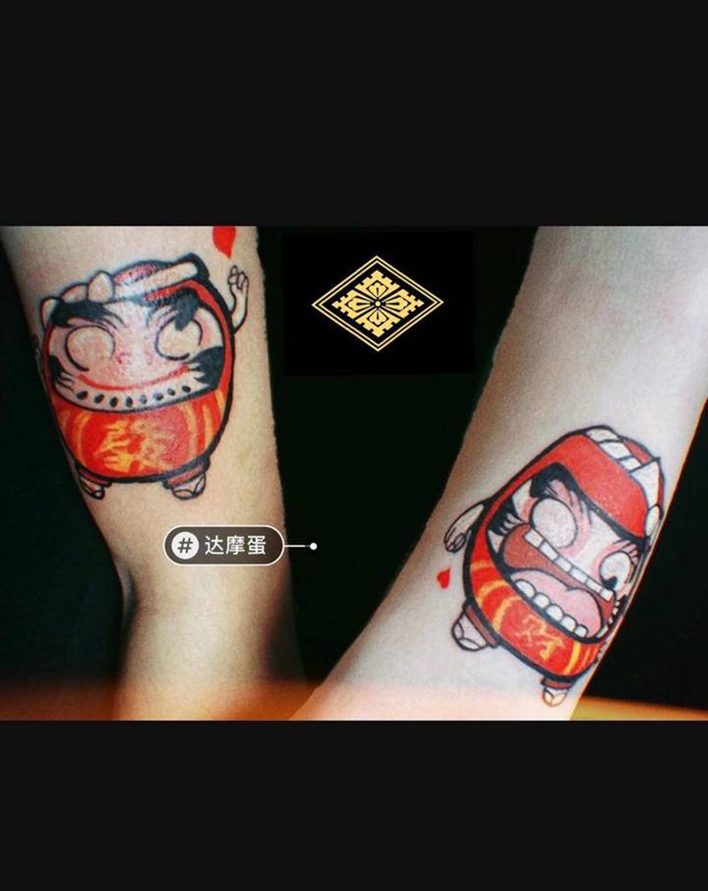 情侣达摩纹身图片_手臂新传统纹身图案