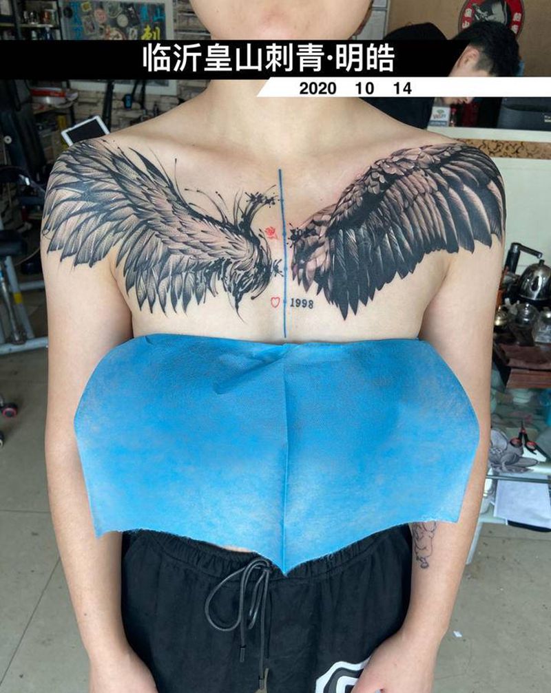 遮盖纹身图片_胸部欧美写实几何遮盖纹身图案