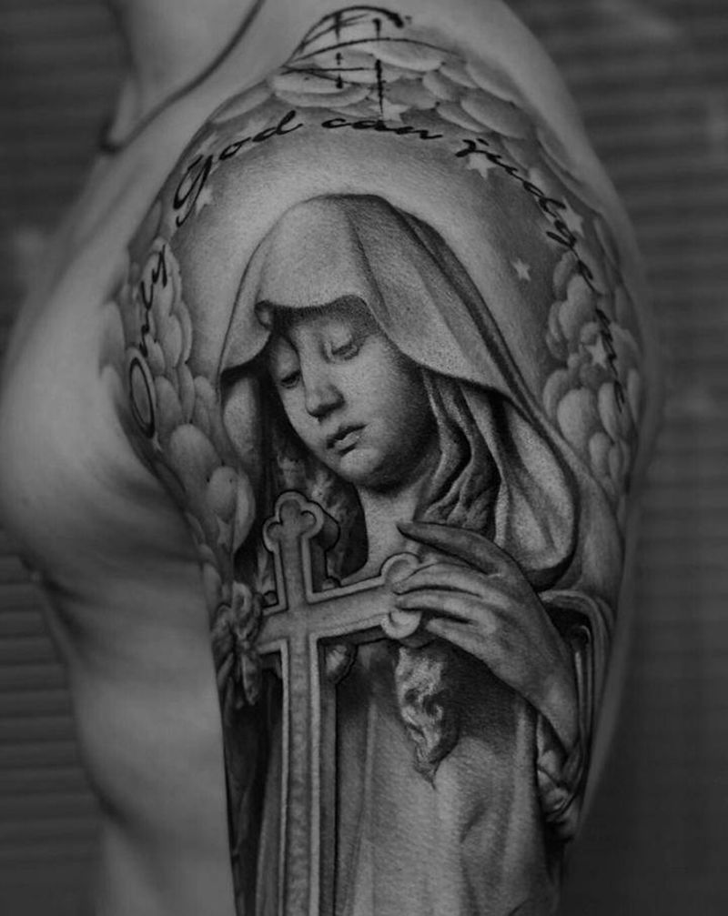 信仰是严肃的纹身图片_手臂欧美写实纹身图案