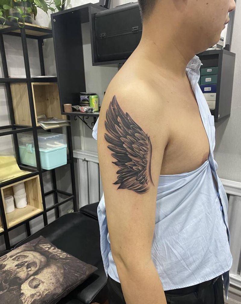 单飞纹身图片_肩部纹身图案