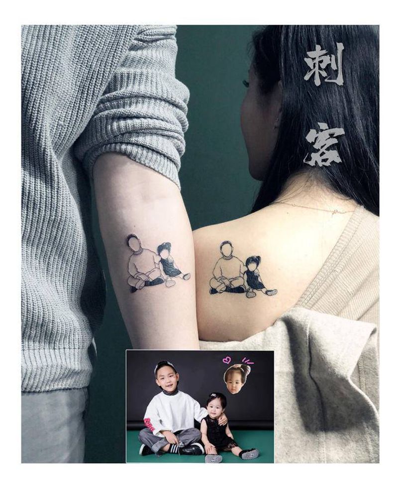 儿女极简风纹身图片_手臂肩部纹身图案