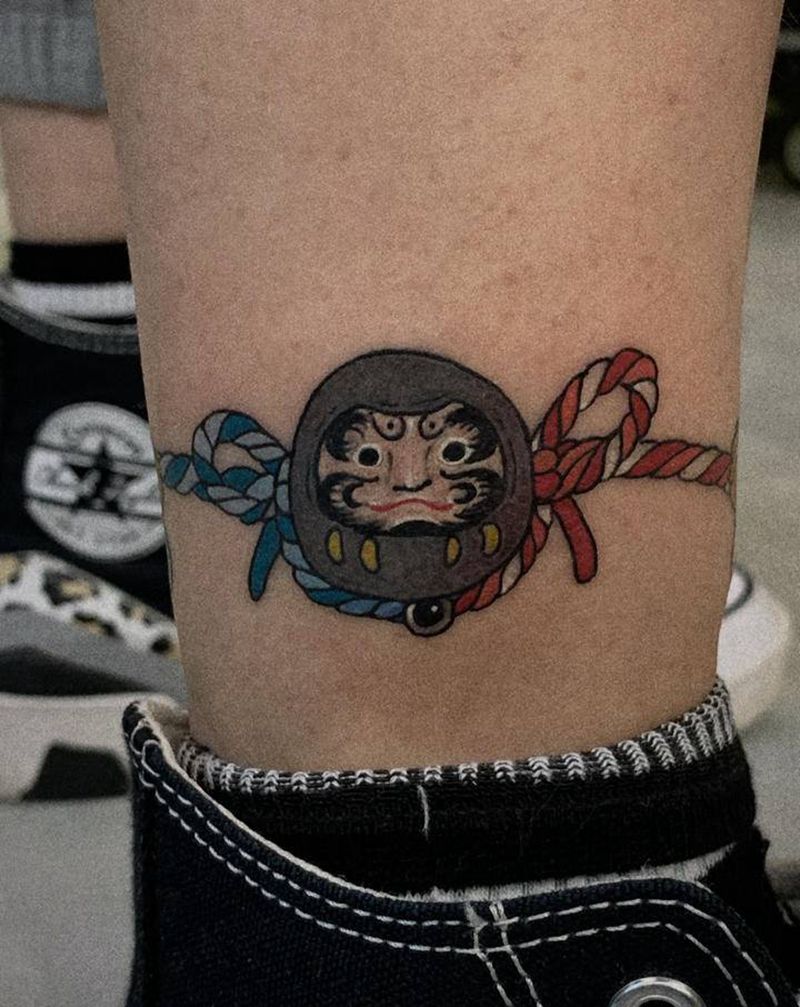 达摩脚环纹身图片_腿部New School纹身图案