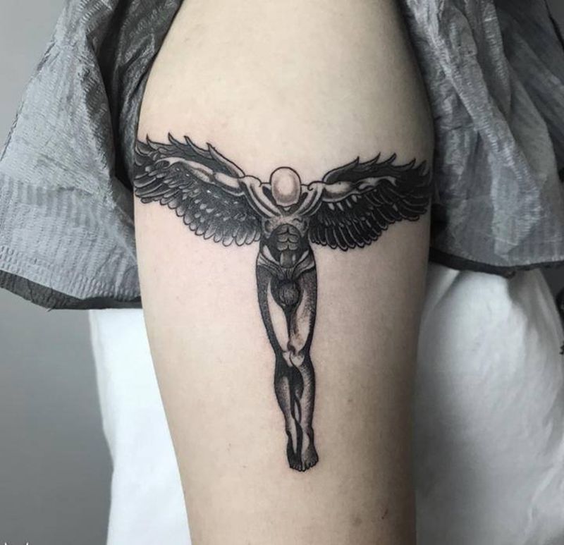 翅膀纹身图片_手臂几何纹身图案